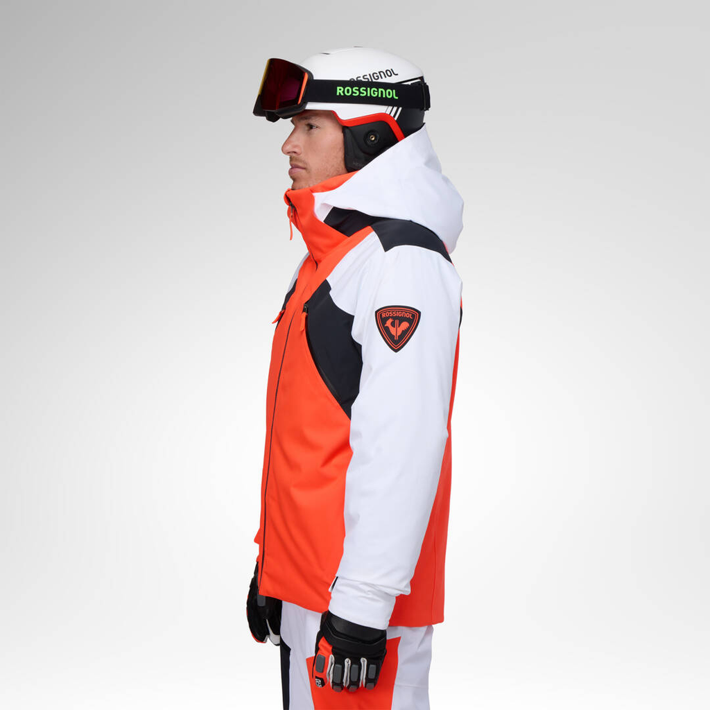 Giacca Rossignol Hero 4-Way Stretch Puffy Neon Red, vista laterale indossata