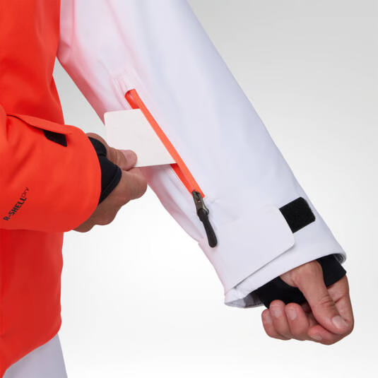 Giacca Rossignol Hero 4-Way Stretch Puffy Neon Red, dettaglio della tasca sulla manica e del polsino